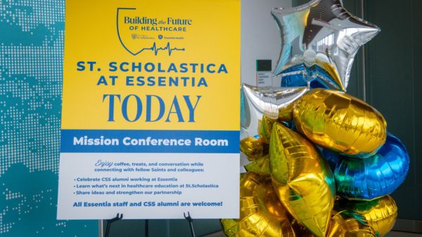 CSS at Essentia Health Day poster with balloons.