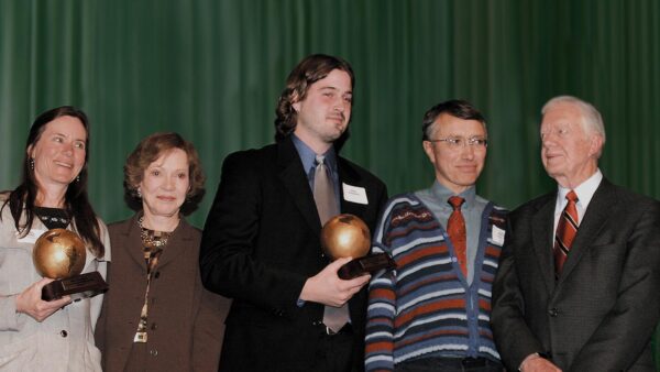 2004 Carter Partnership Award recipients pose with President and Mrs. Carter