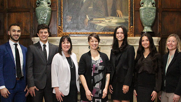 St. Scholastica's Innovation Scholars team poses with their mentors