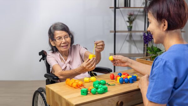 St. Scholastica OT student demonstrates assistive technology