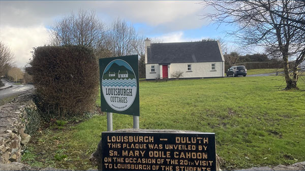 A photo of the Louisburgh cottages in Ireland.