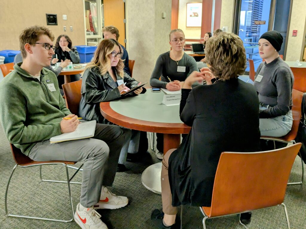 St. Scholastica students listen to a healthcare professional from Essentia Health.