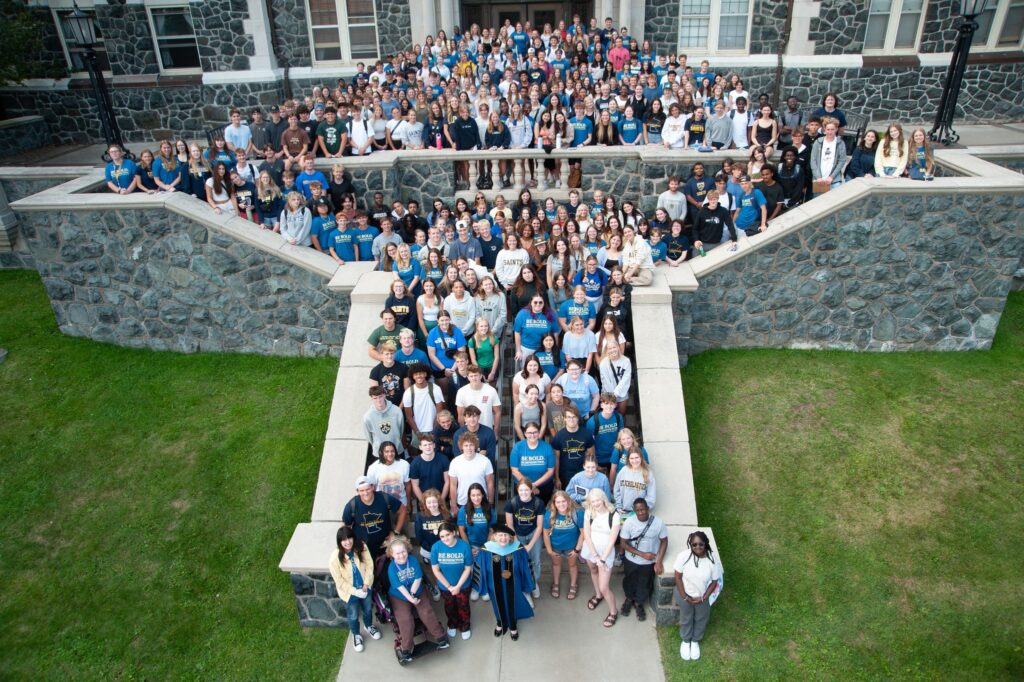 The Class of 2028 grouped together on the steps of Tower Hall.