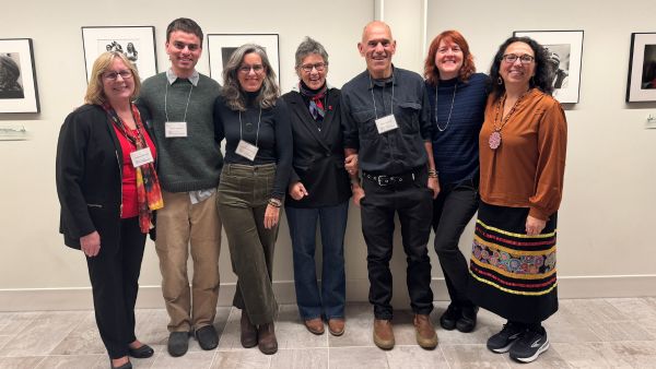 Barbara McDonald and Amy Bergstrom attend the AIM Exhibit event with members of the Bancroft family.