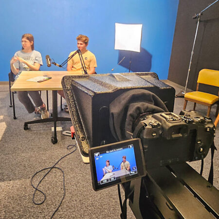 Students working on a production in St. Scholastica's Communication and Media Studies studio.