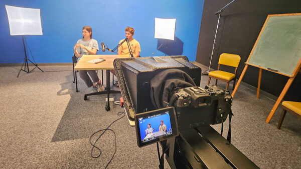 Students working on a production in St. Scholastica's Communication and Media Studies studio.