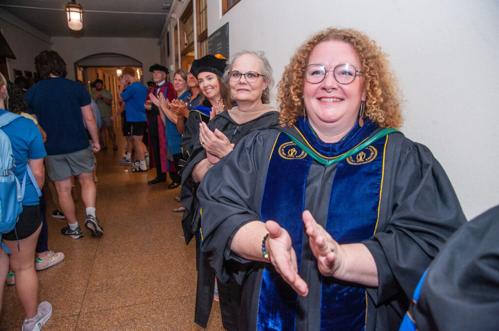 Faculty lined up on the first floor of Tower Hall to greet students for convocation.