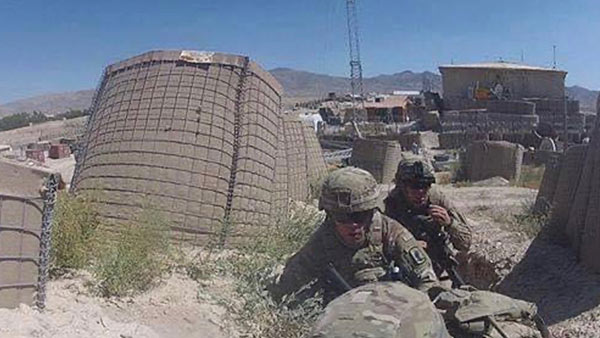 Sergeant Jonathon Whaley and fellow soldier in combat in the Logar Province, Afghanistan