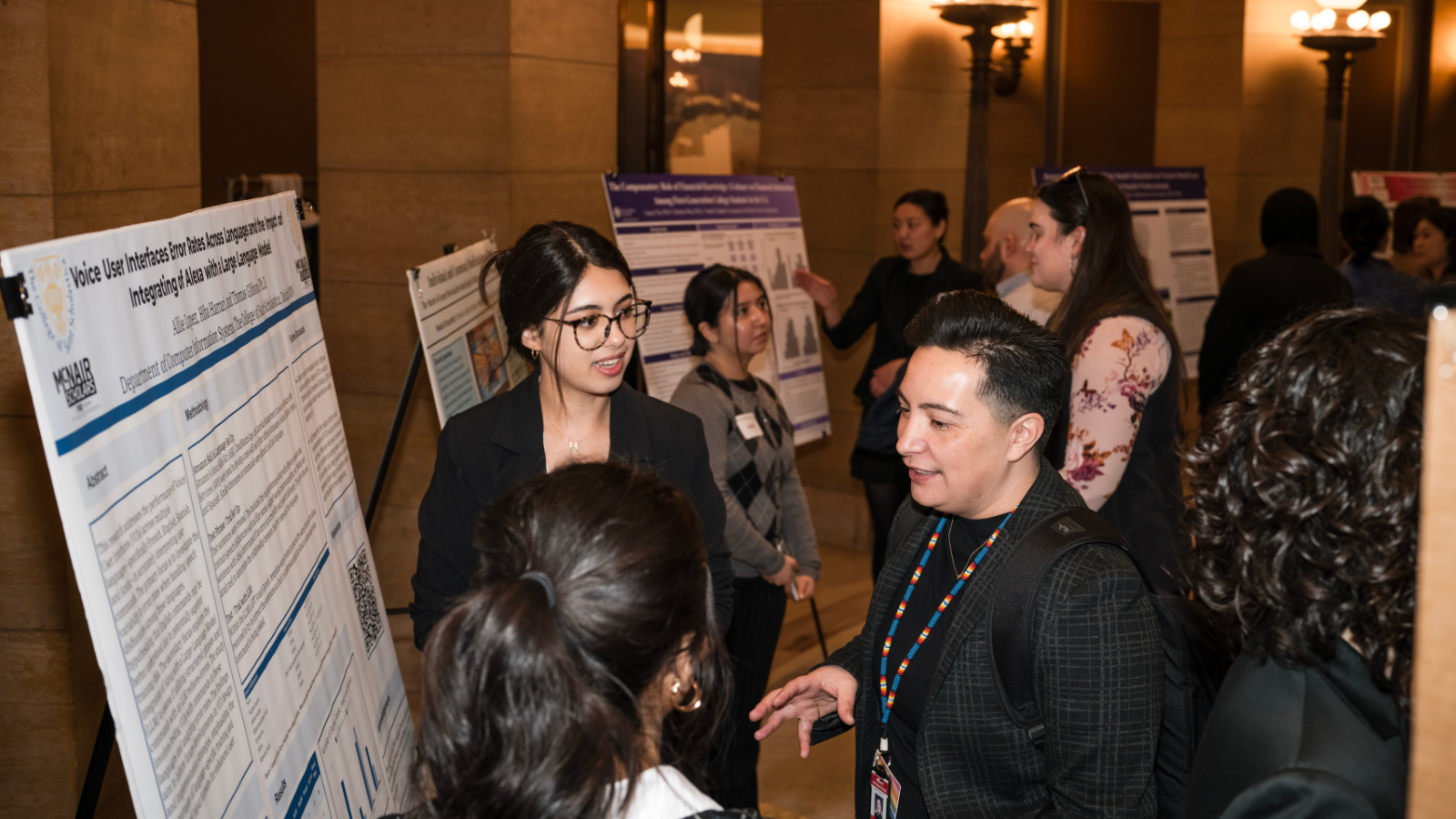 Allie Lopez '26 and Hiba Harrari '26 interact with lawmakers and public.