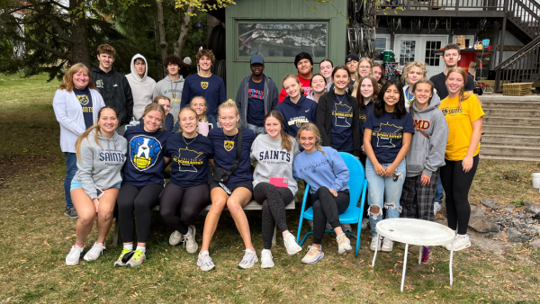 Group of students volunteering with Loaves & Fishes for Community Day.