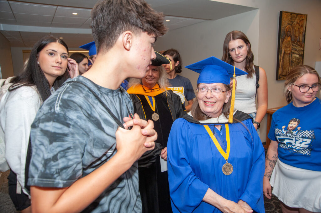 Students interact with alumni at Convocation.