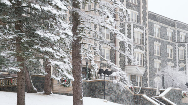 Side view of Tower Hall on a snowy winter day, covered in frost.